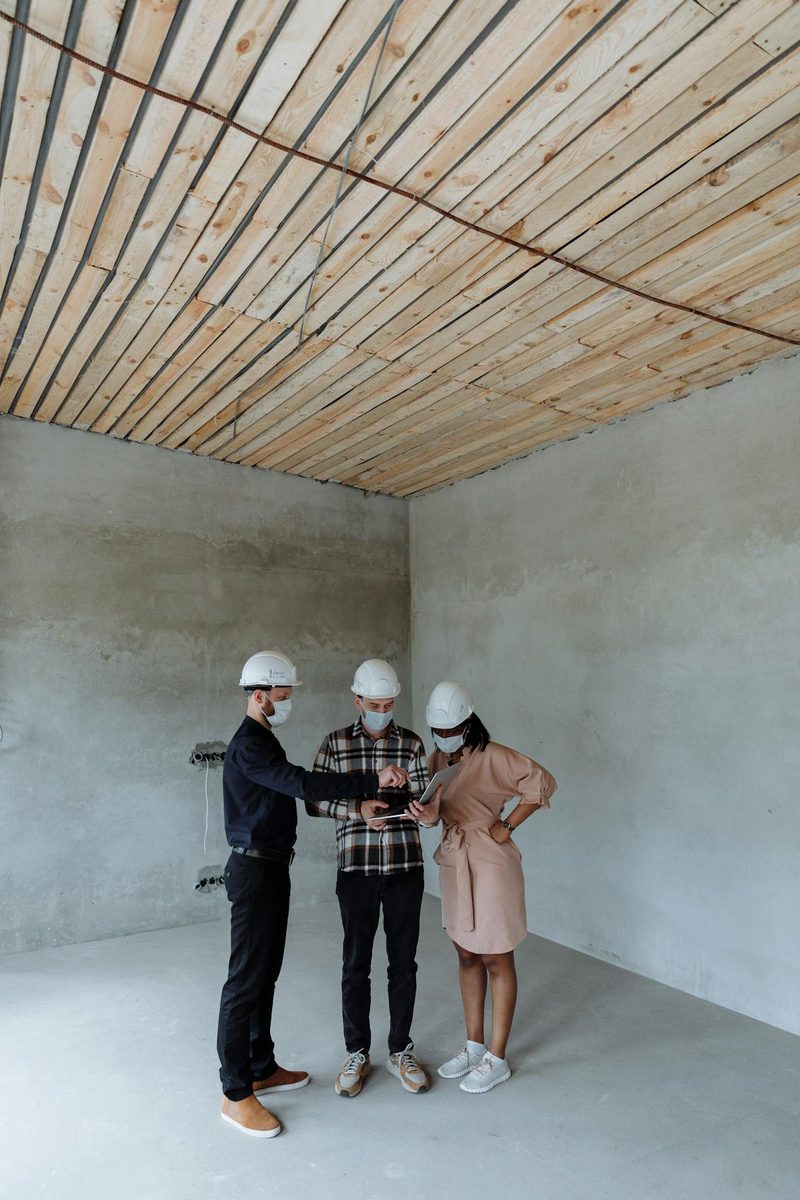 Commercial office renovation team discussing plans in West Palm Beach Florida